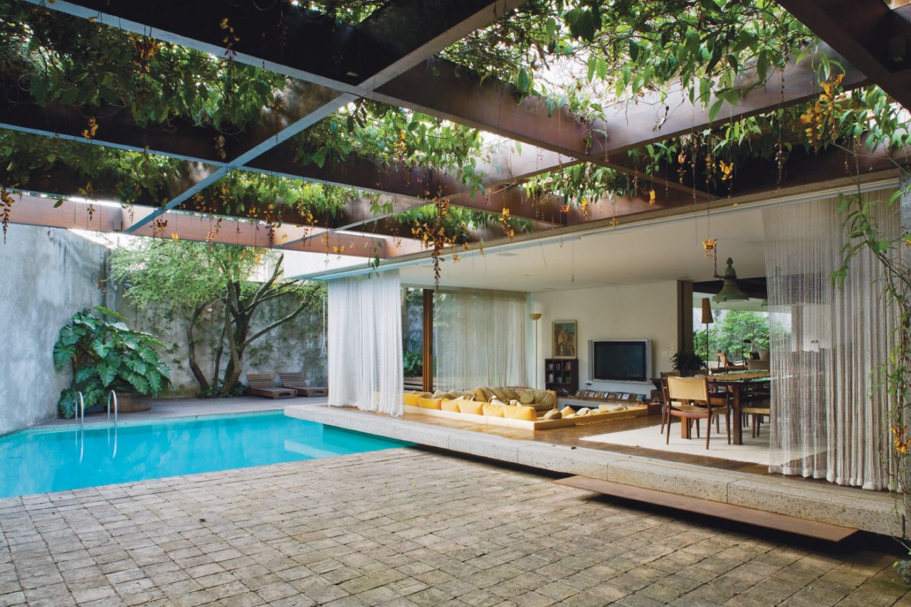 Interior photo of a covered patio and pool