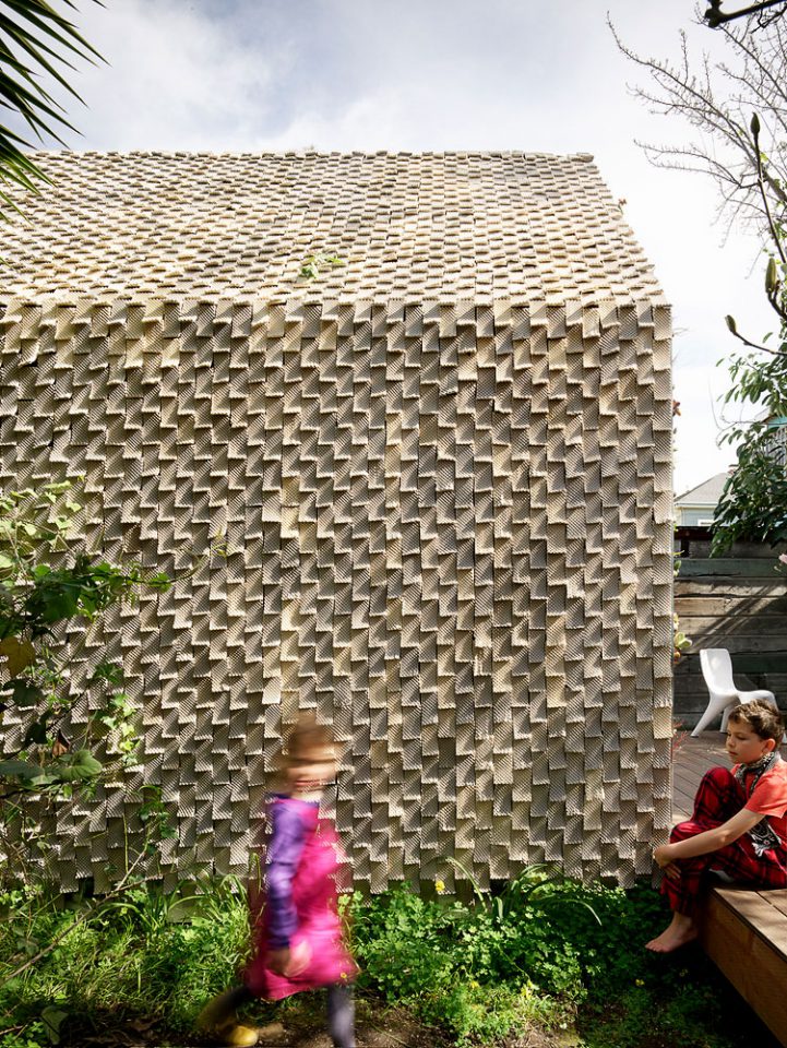 A cabin exterior clad in knurled tiles