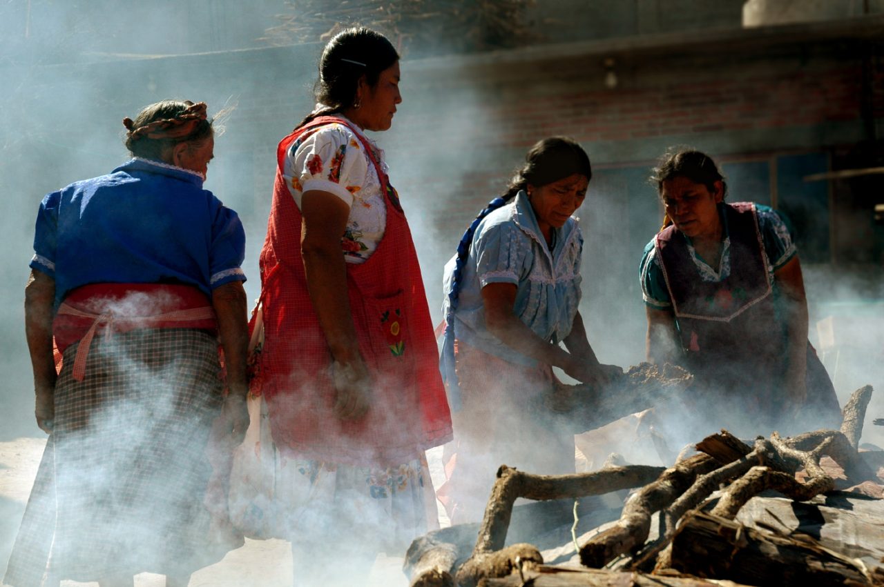 Indigenous women making ceramics