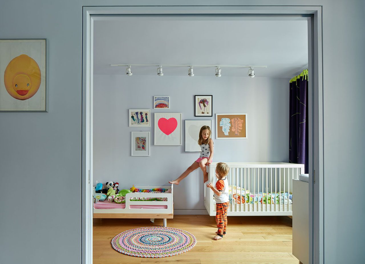 Photo of two children in a bedroom