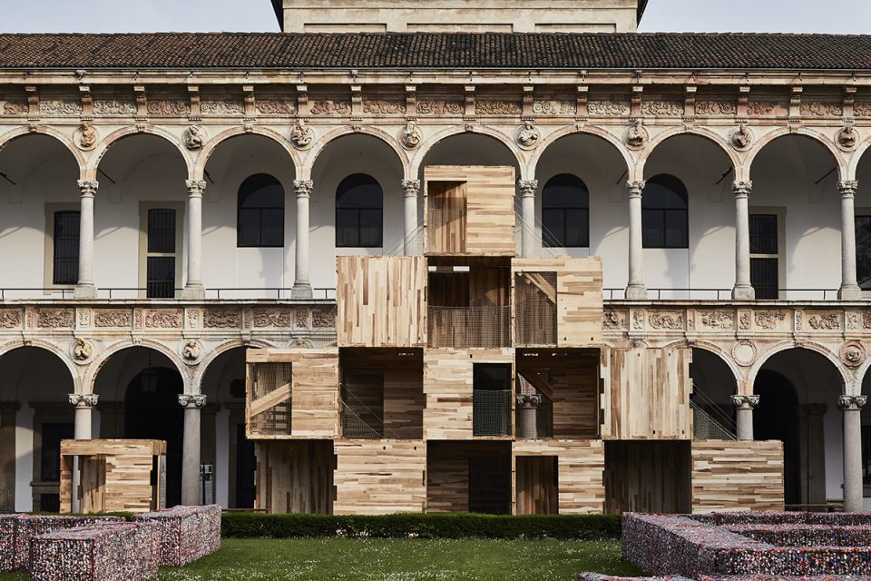 Image of stacked boxes in Italian courtyard