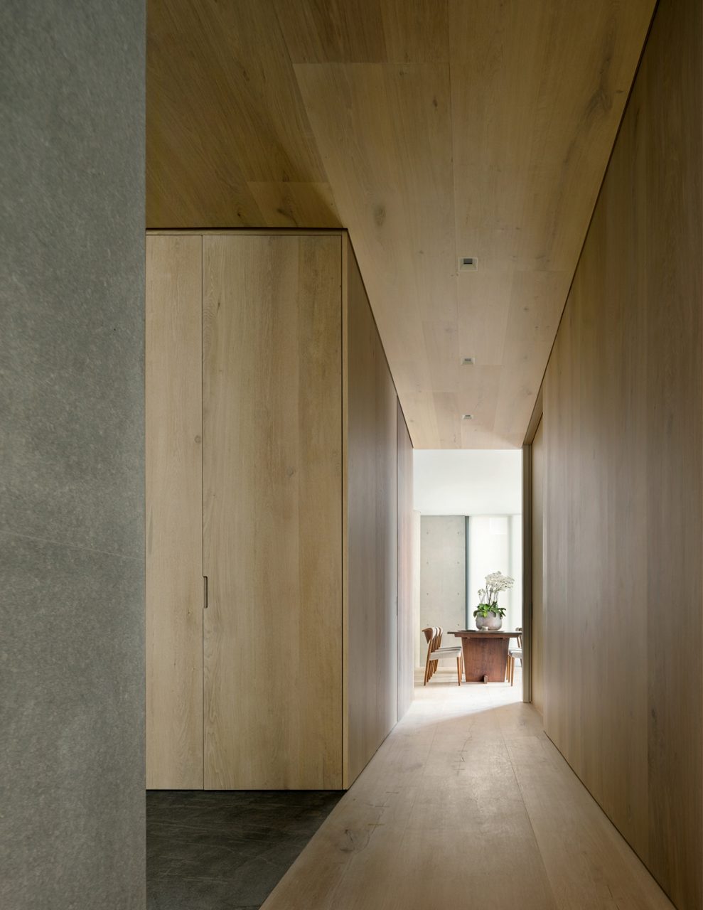 Photo of wood-clad interior hallway in apartment