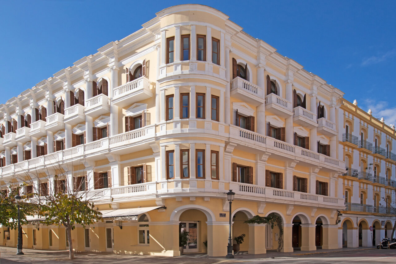 A historic exterior of a hotel in Ibiza