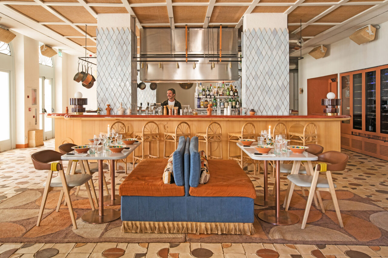 A hotel restaurant merges traditional tiles and modern materials