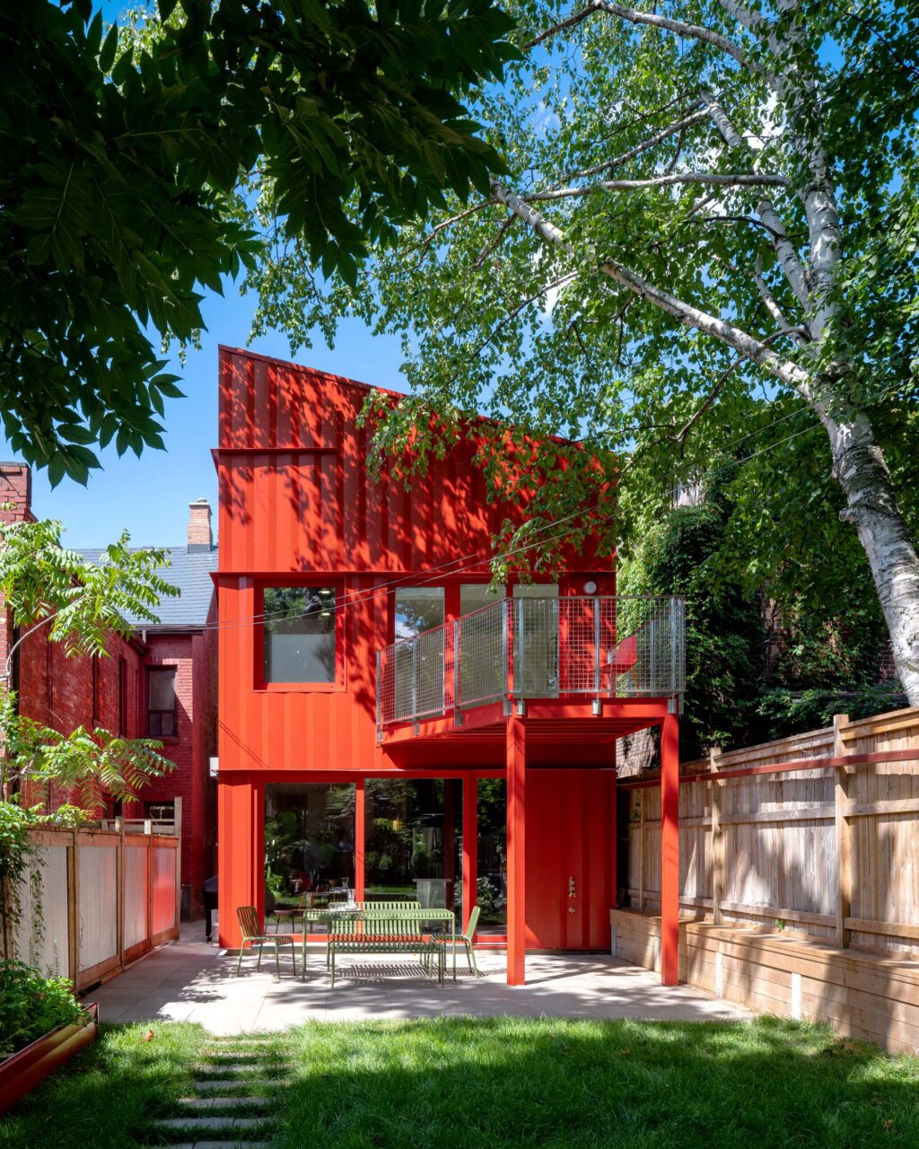 A back of the house is a red steel expansion