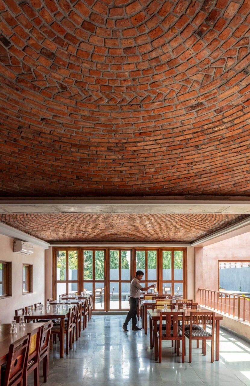 brick ceiling and pink plaster walls