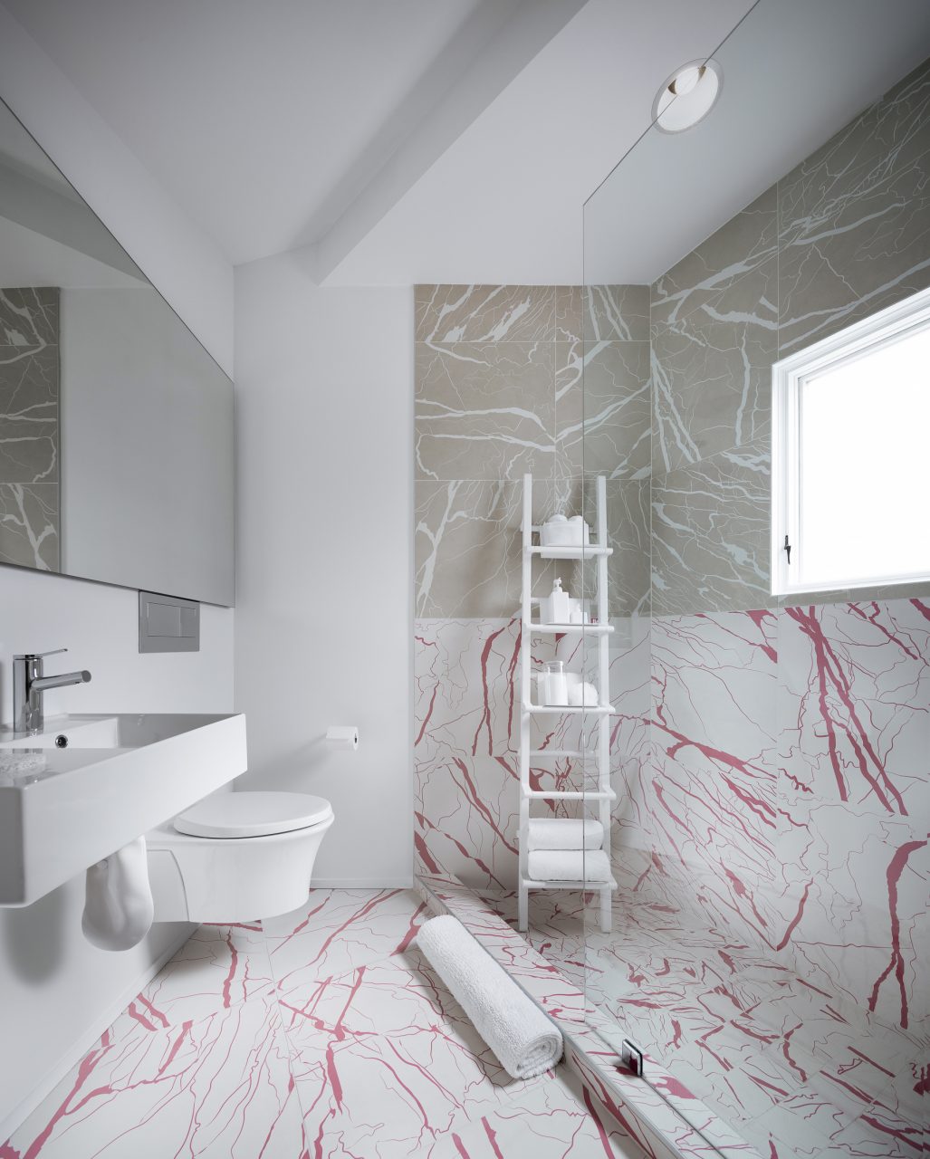 Image of Haus Gables white and pink bathroom
