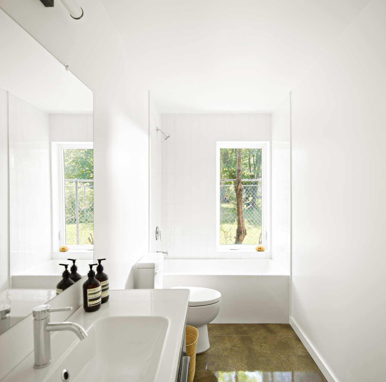 interior photo of a bathroom with sink and tub
