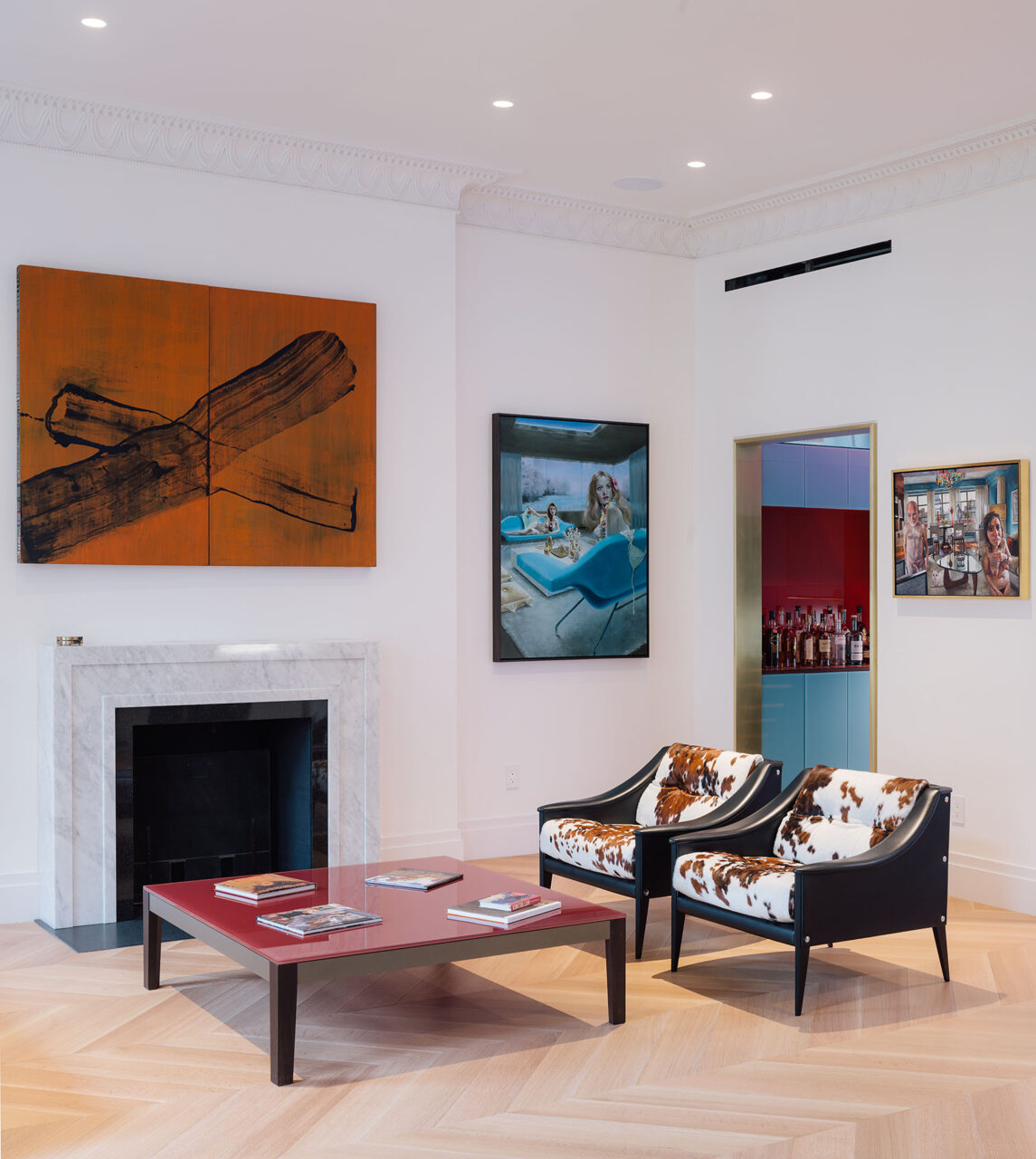 Bold artworks make up this living room that doubles as a gallery