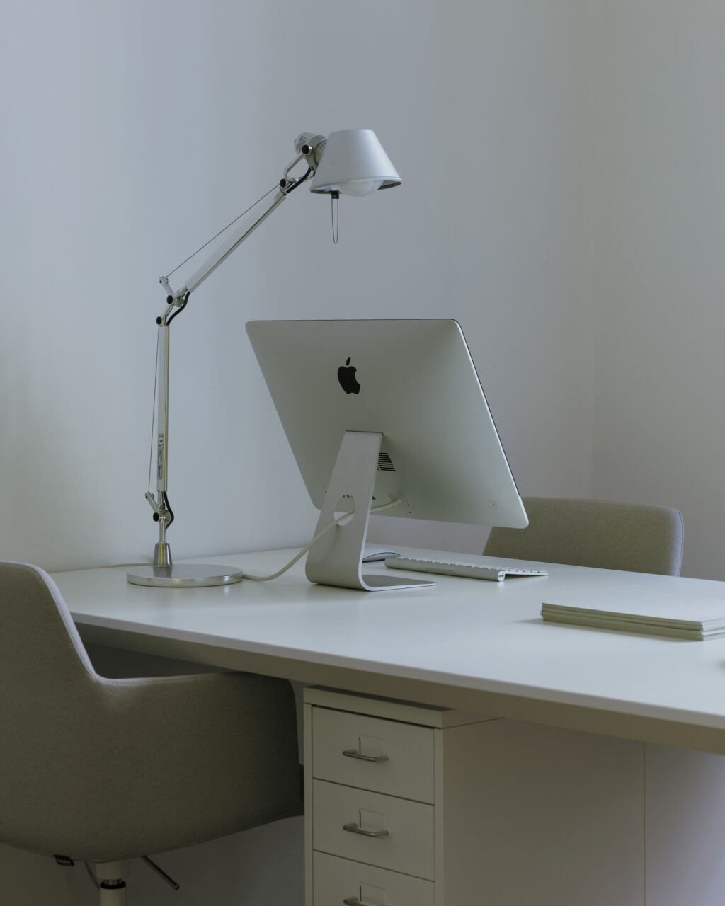 A work table in a white room and work lamp
