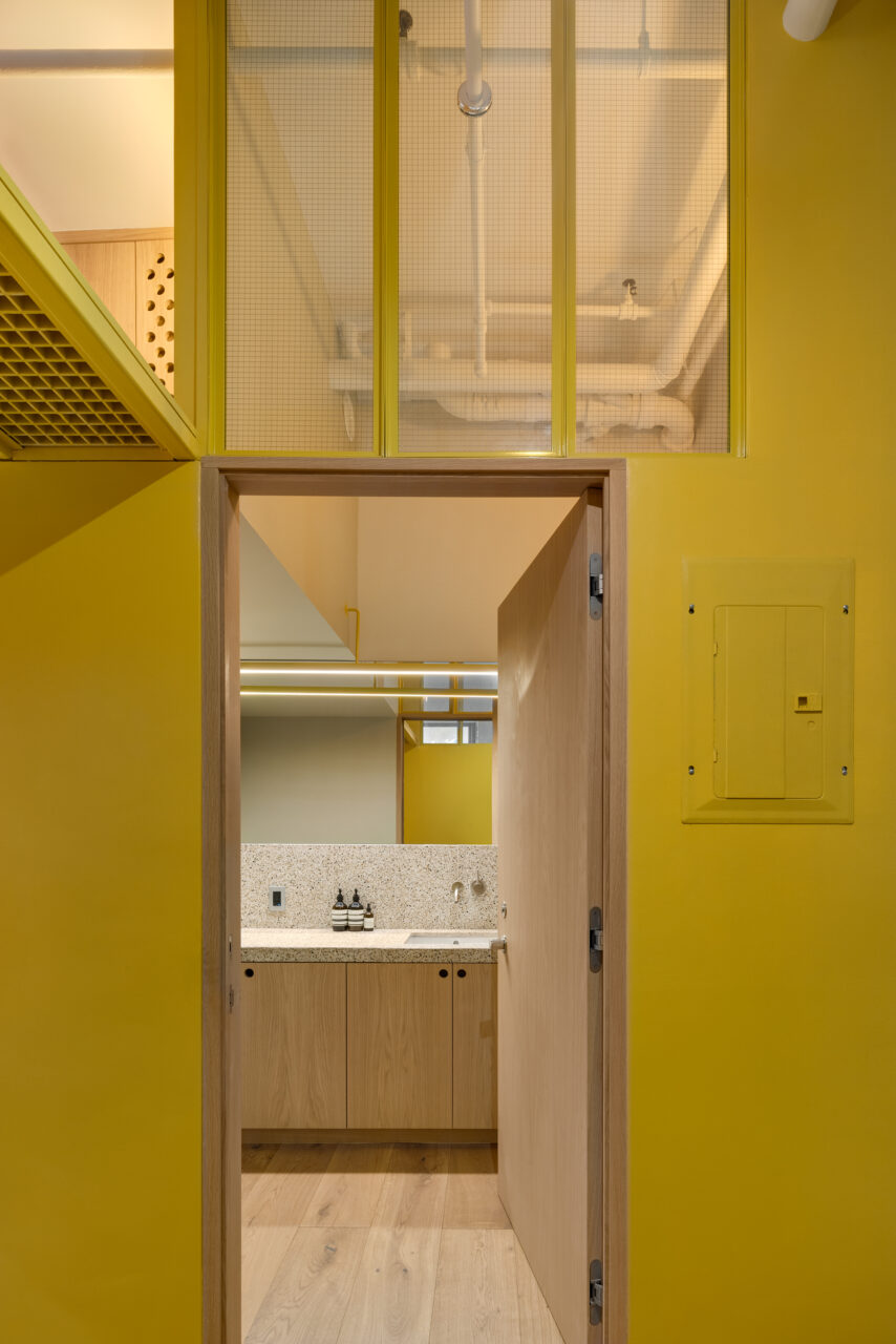 wood elements and yellow walls