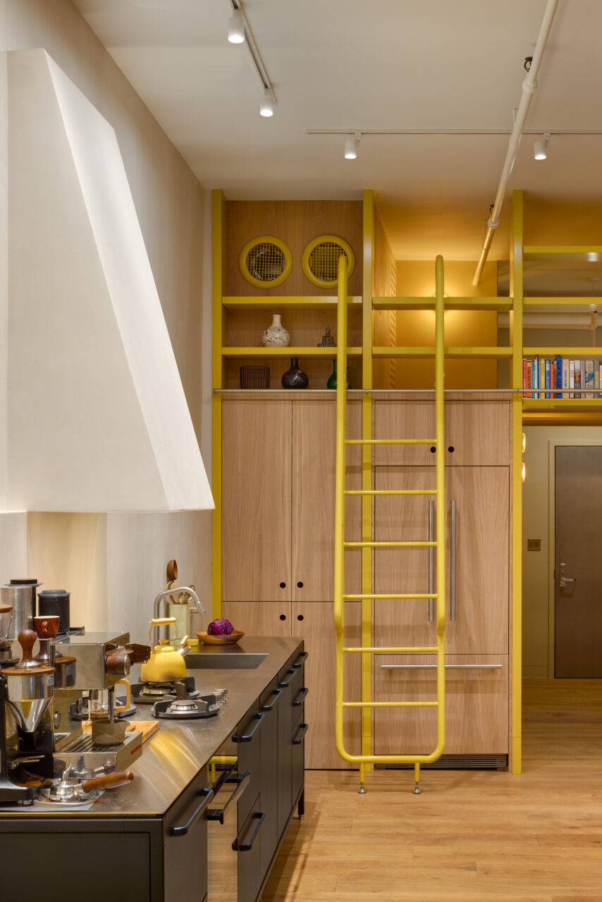 wood cabinets and yellow ladder