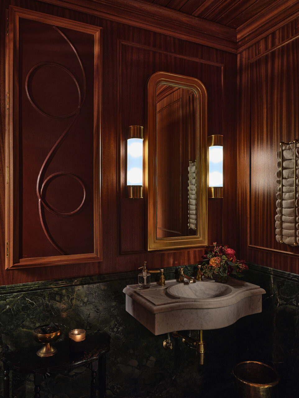 The bathroom by North 45 Projects blends wood and marble