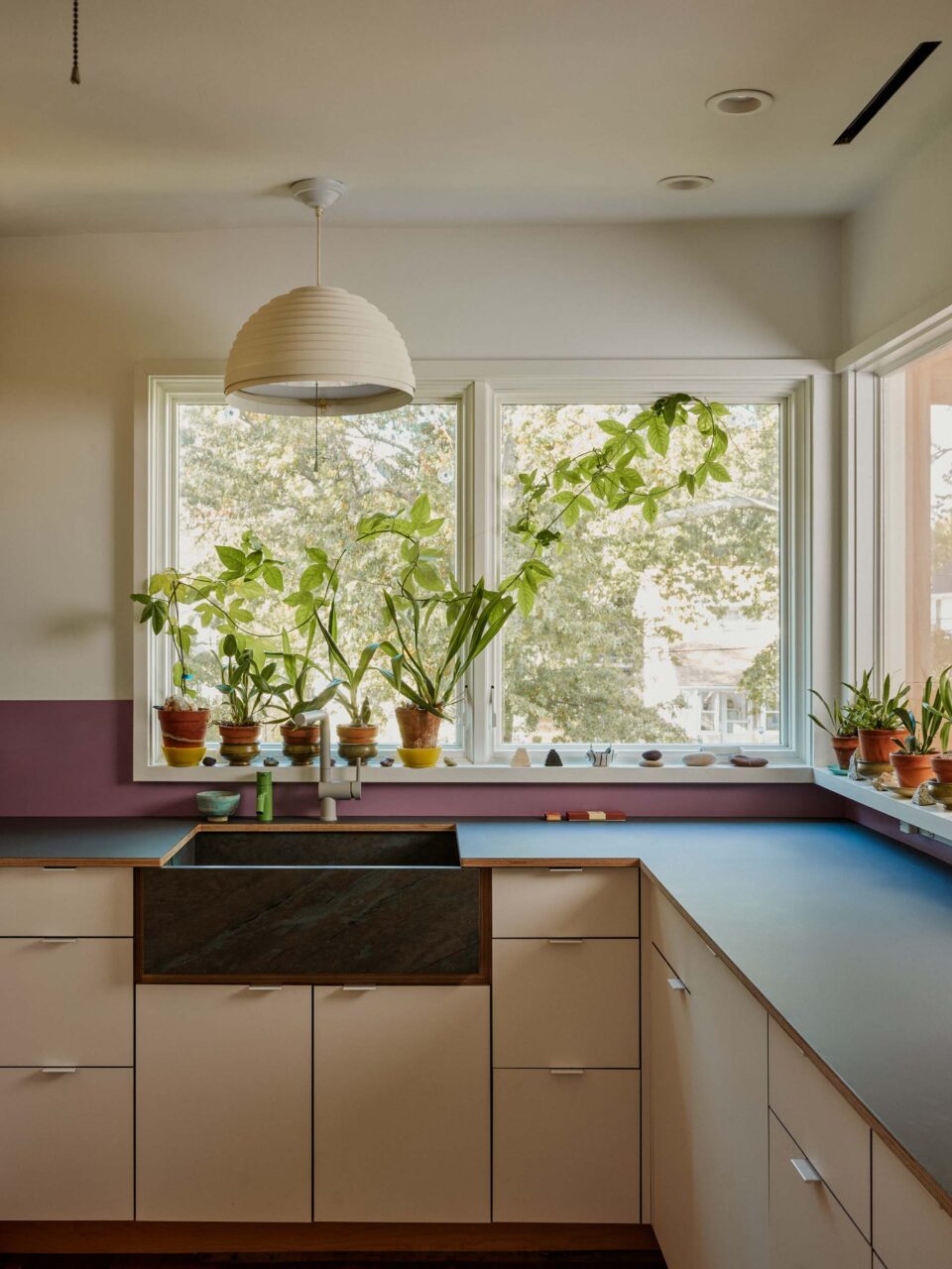 kitchen counters with corner windows