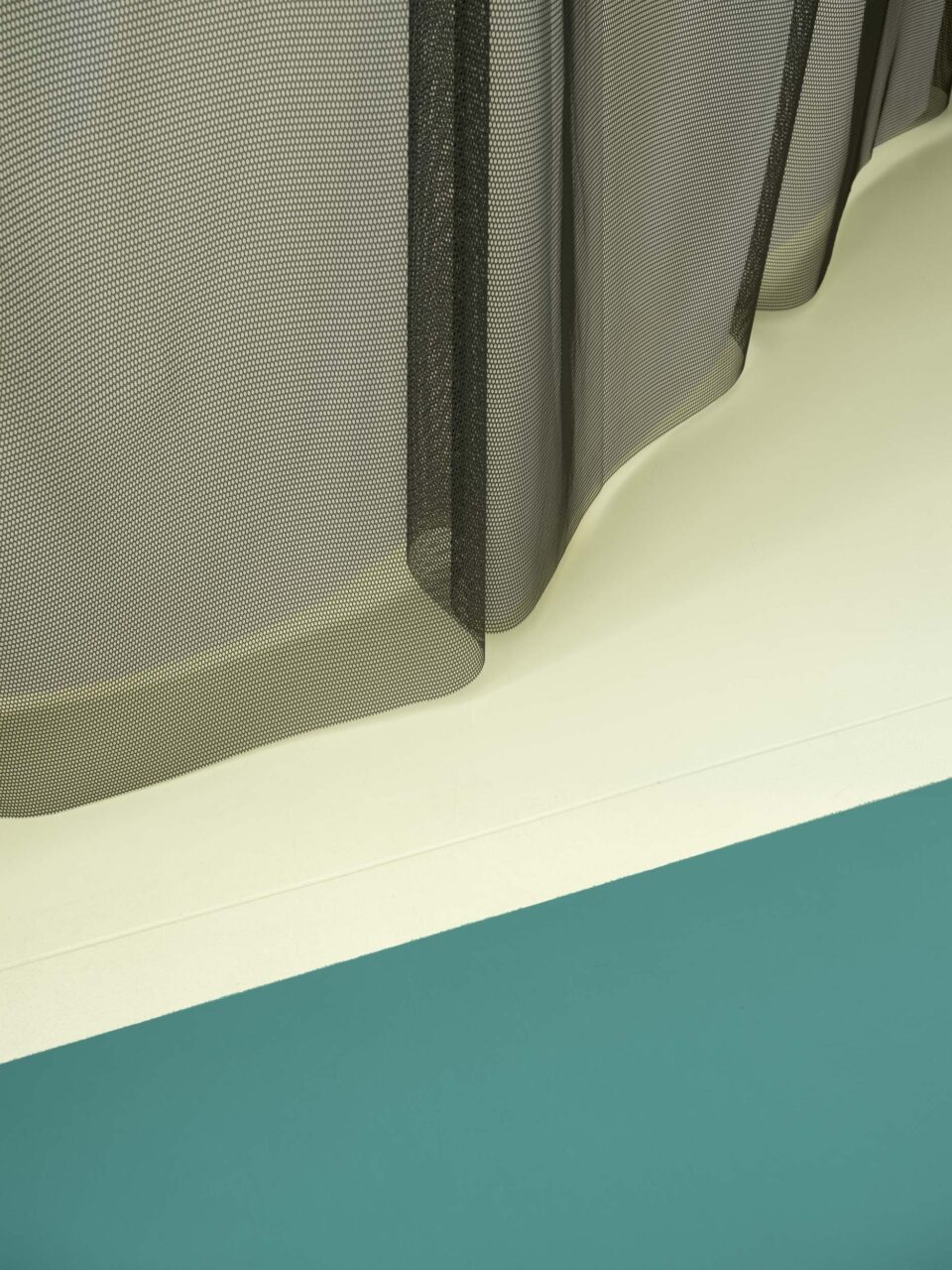 teal flooring and mesh