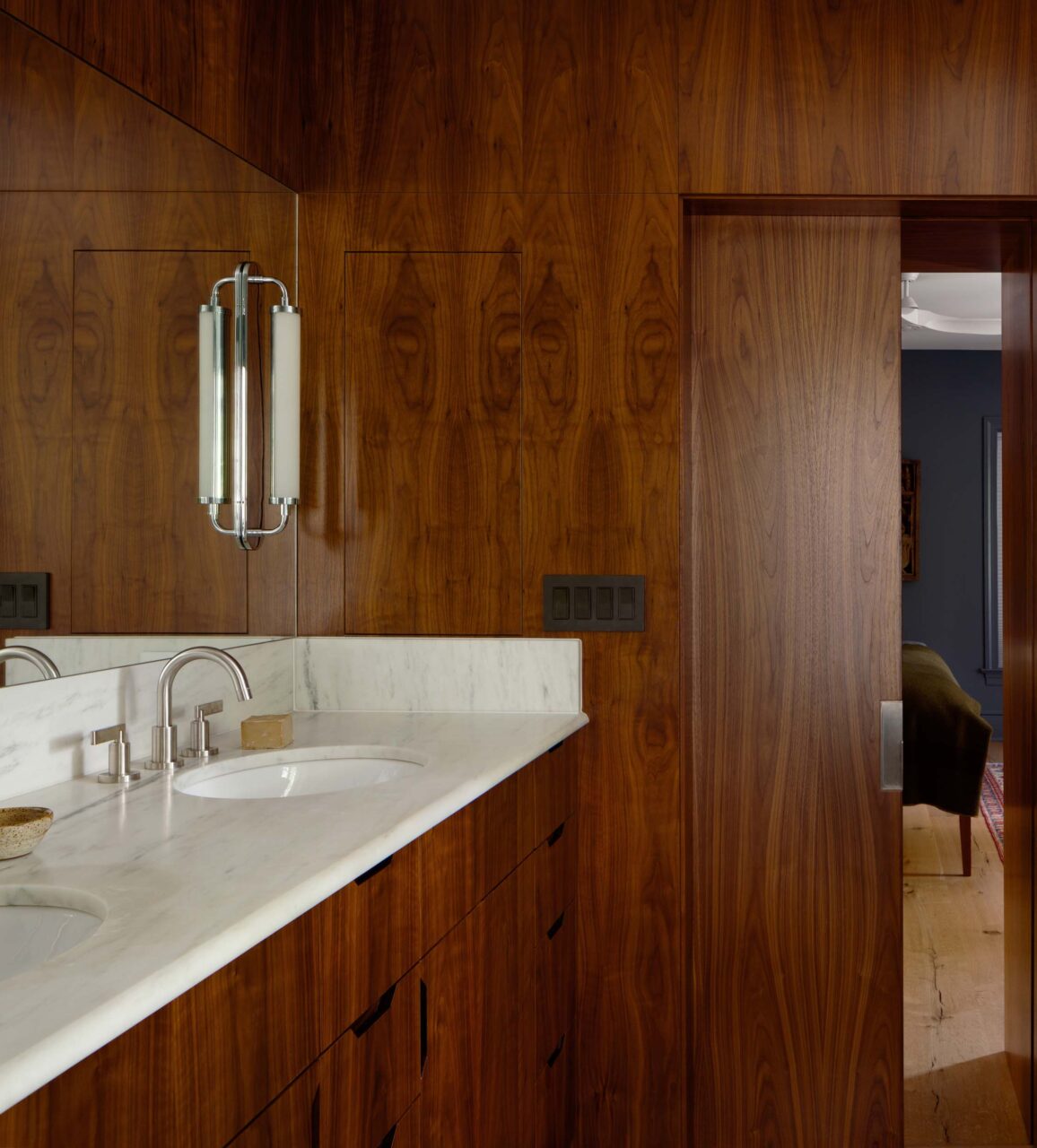 Walnut coats the bathroom at Cleveland Park House