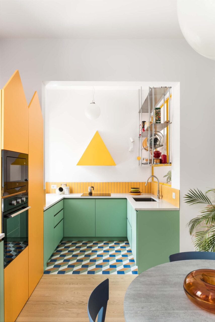 Custom cladding surrounds the refrigerator at an apartment by 02A