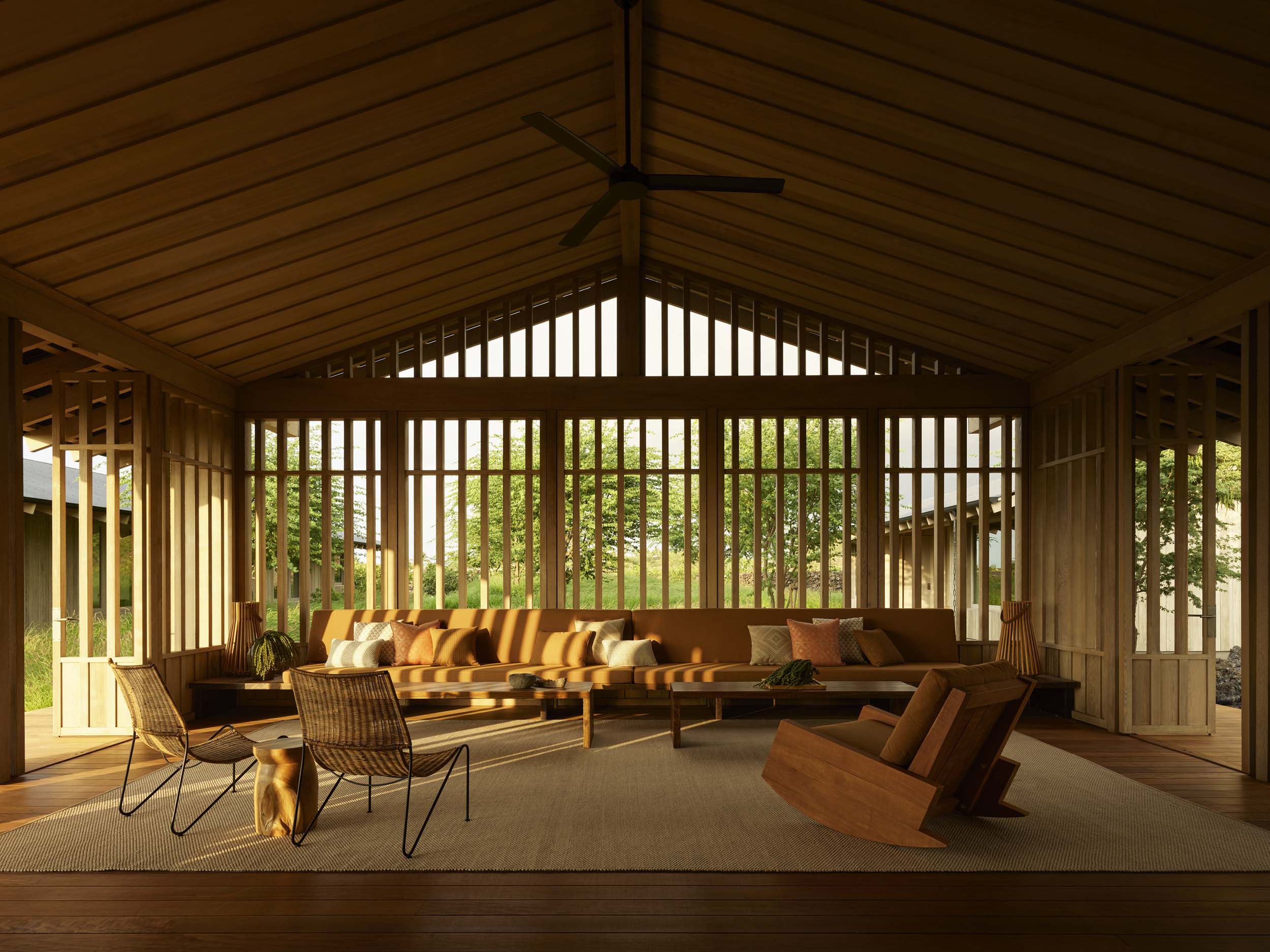 A minimalist living room with slatted oak designed by Walker Warner
