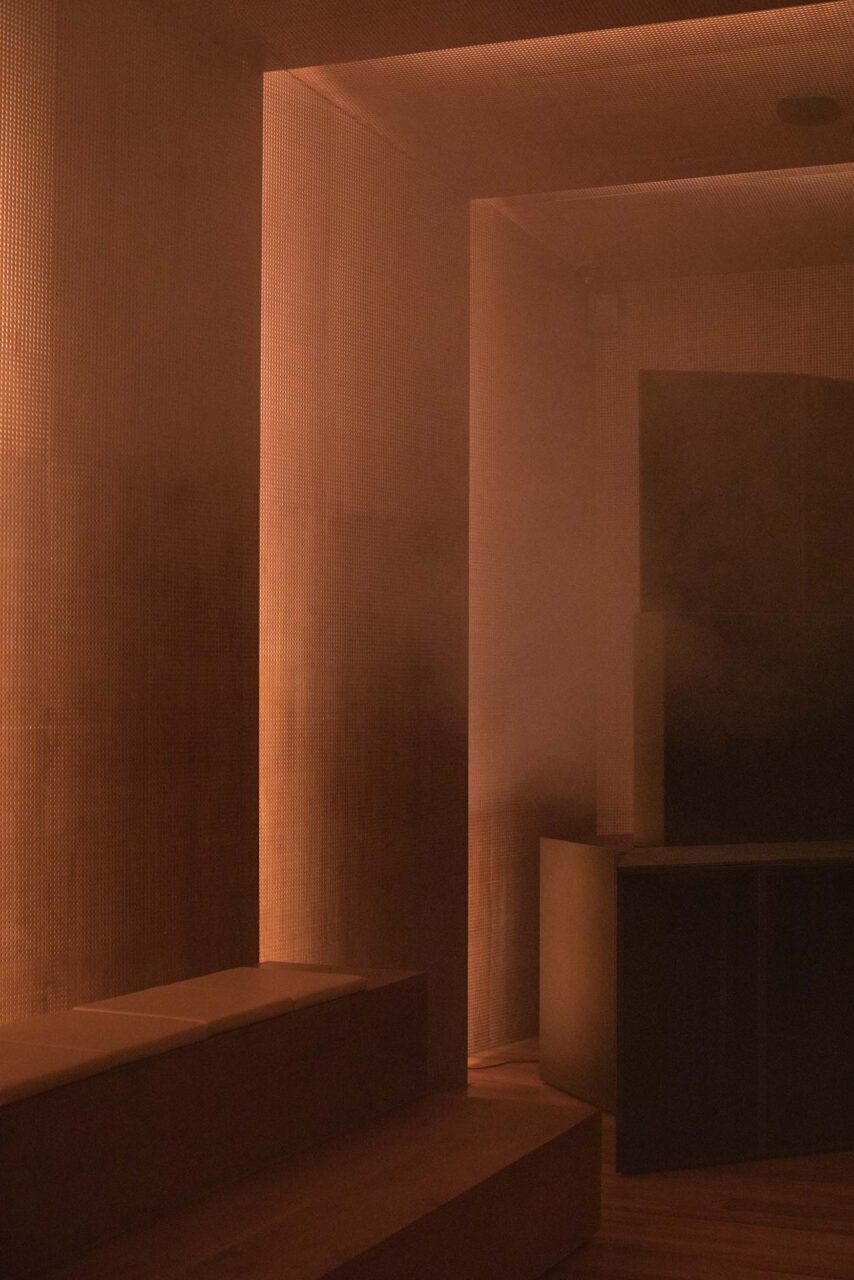 Linear wall-to-ceiling lights are part of DJ Harvey and OMA's nightclub design