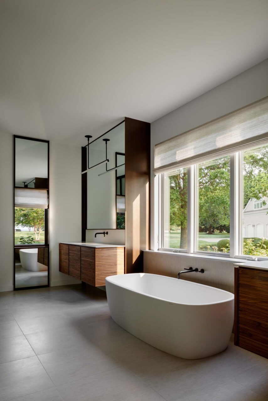 A bathroom with clean, modern interiors by Colleen Healey and Hendrick Interiors