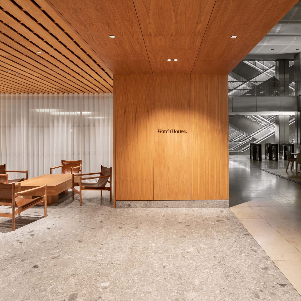 The entrance to WatchHouse within the atrium of an office building