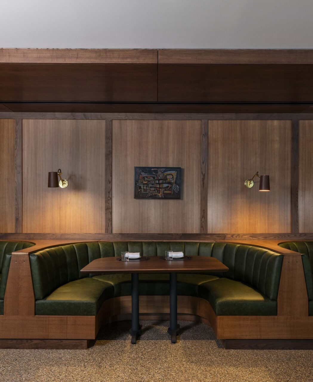A green banquette from Bar Baludorn