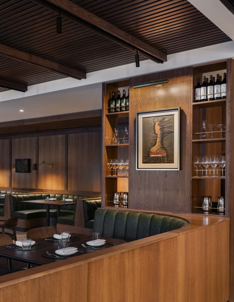 Local Texas artwork hangs on the walls of Bar Bludorn