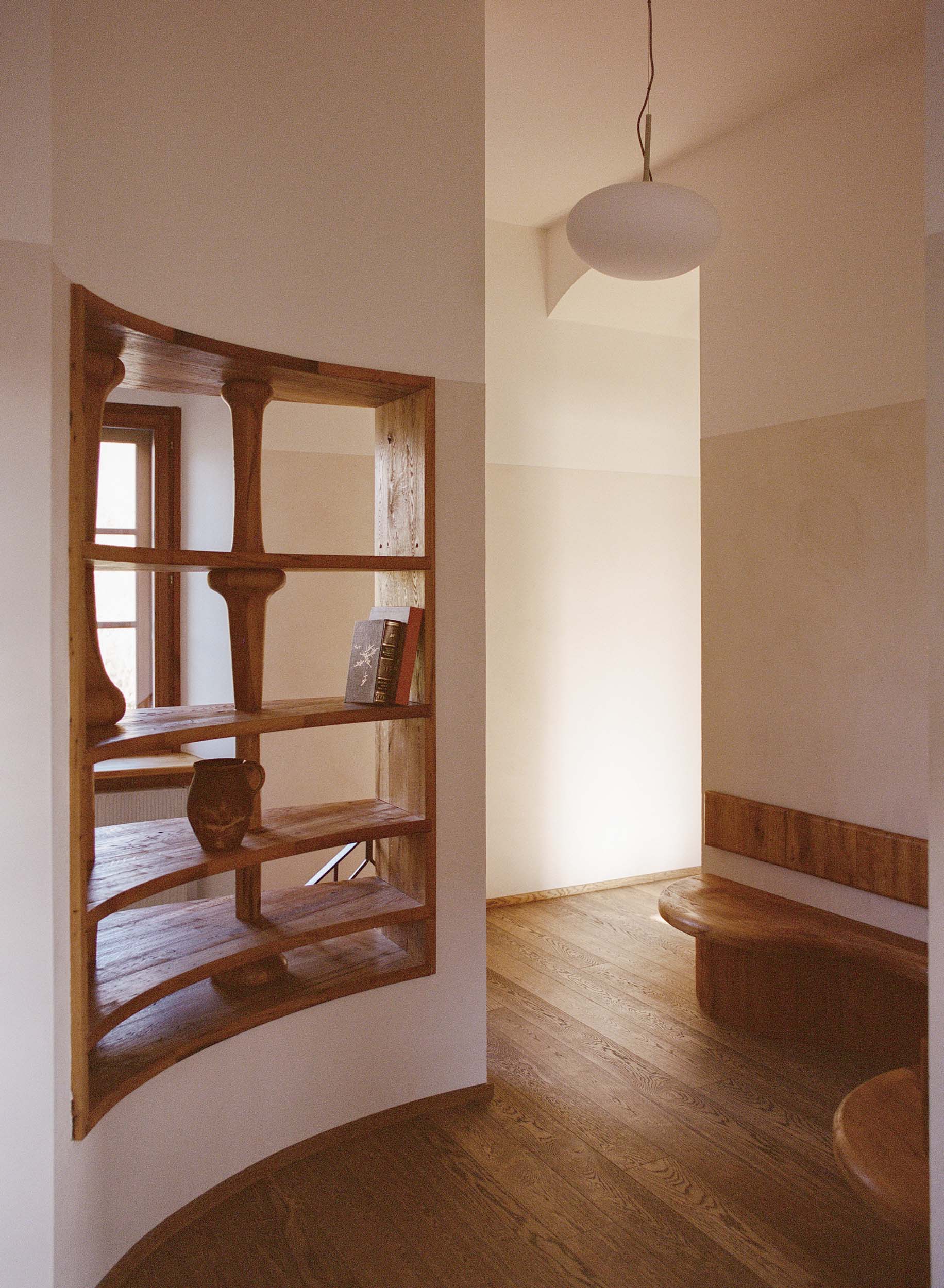 A bookshelf in a 13th century castle, modified by Some Place Studio