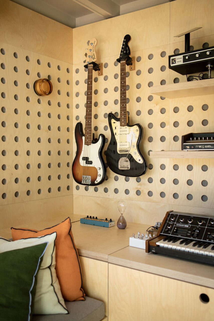 Perforated wood panels in music studio for Jeff in Los Feliz