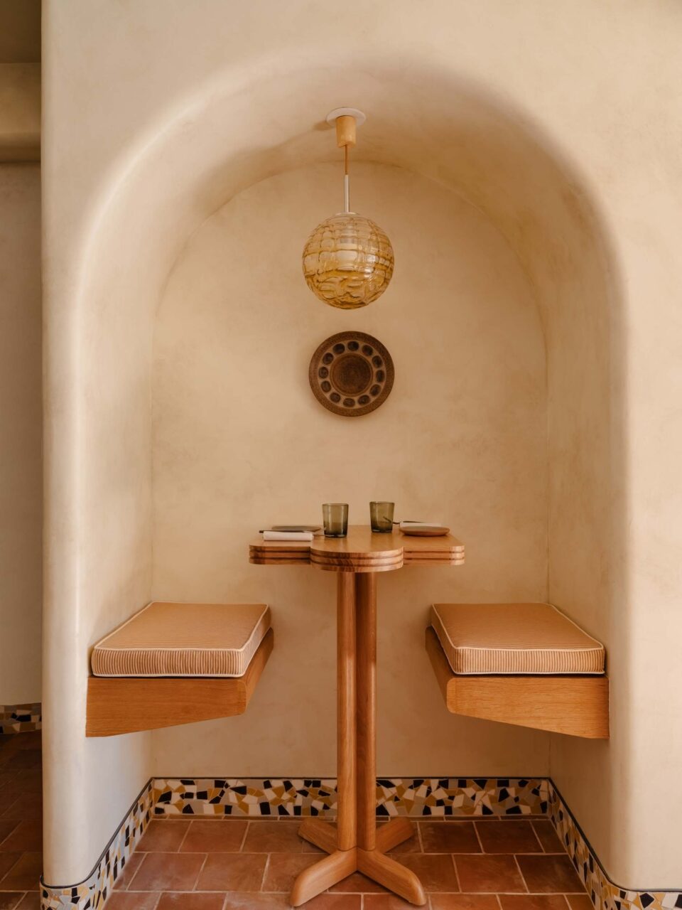 The design of Theodora by Home Studios includes arched nooks