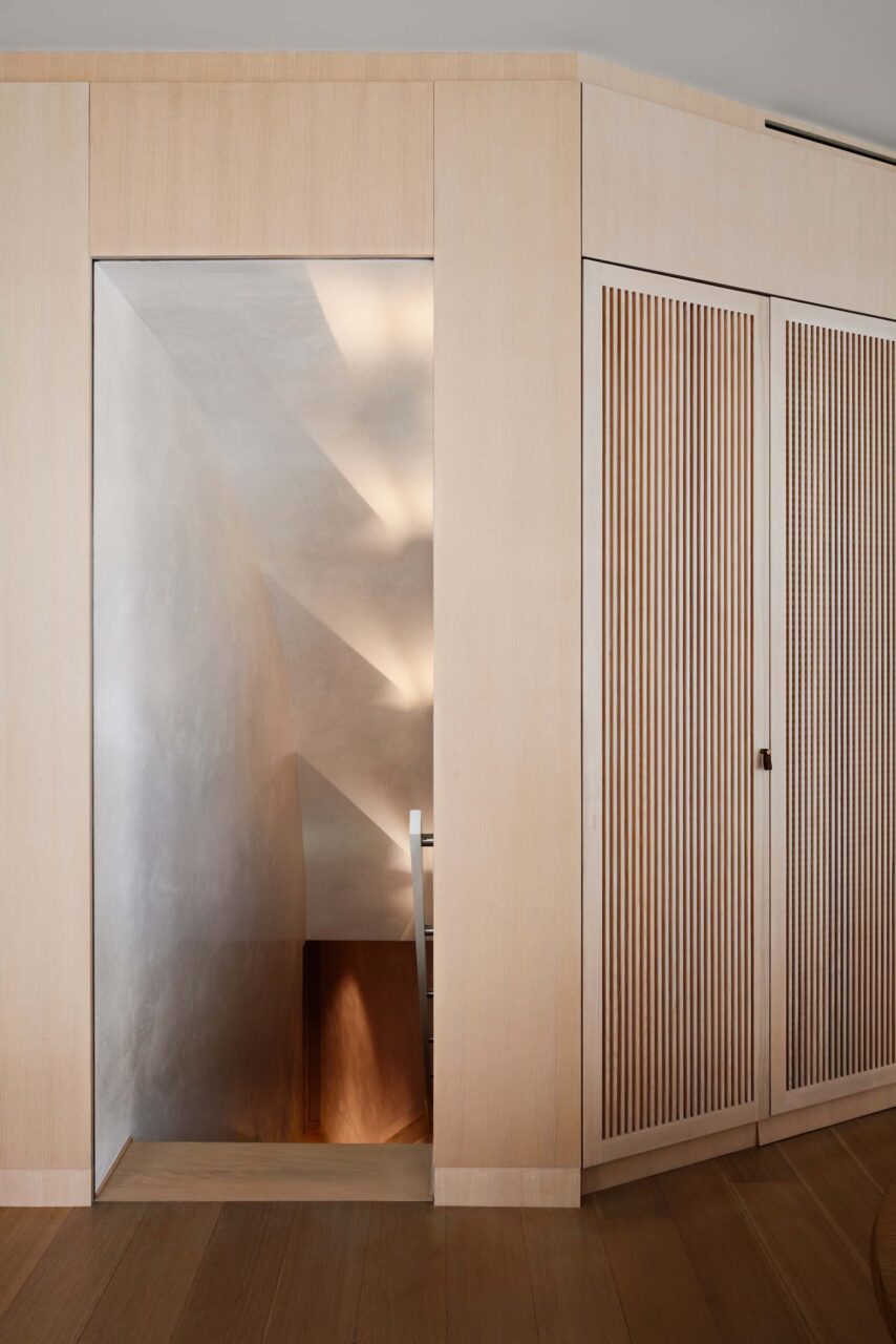 A stairwell with light and shadow in Tribeca