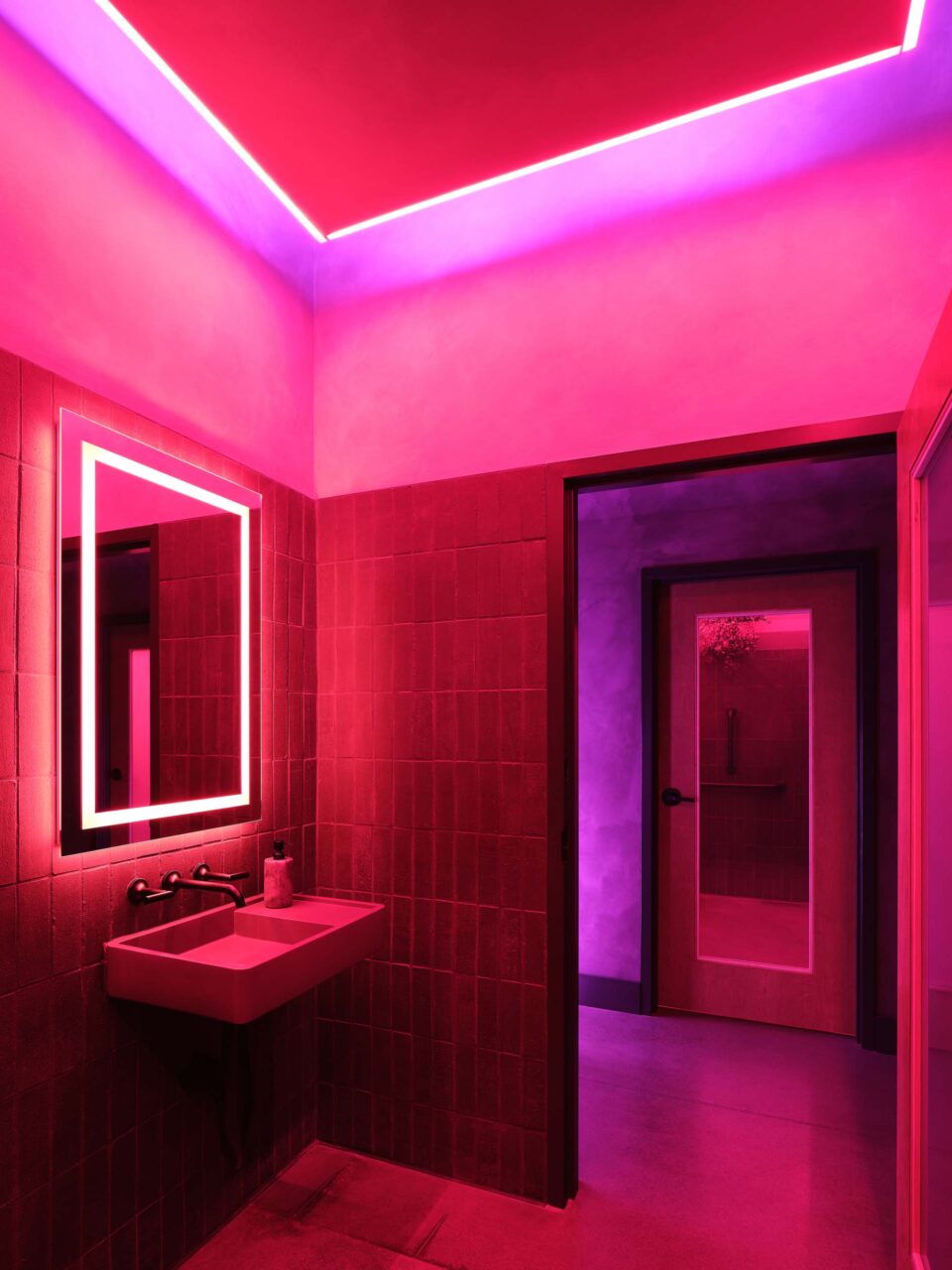 Neon-hued bathrooms as Madre