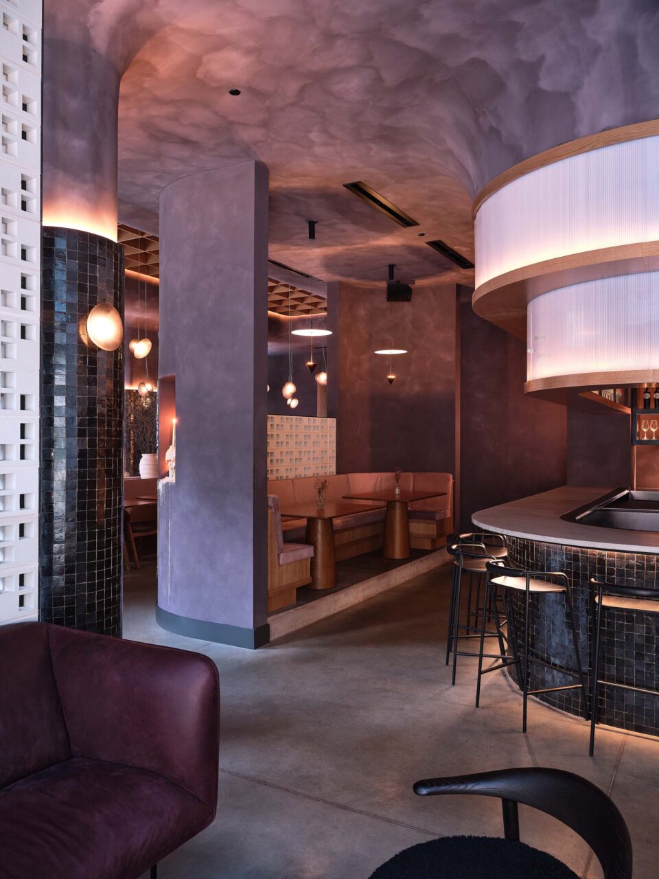 Lukas Peet lighting pendants are featured in Madre