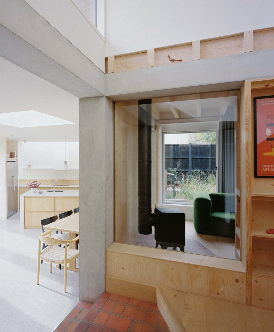 The stairs continues into the kitchen and dining room in Six Columns
