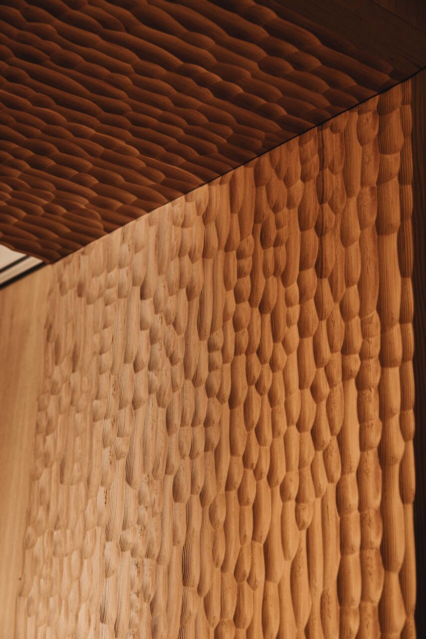 The textured wood inside Barrel Hall