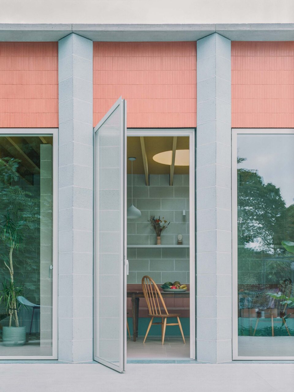 Triangular columns lie on the facade of the home