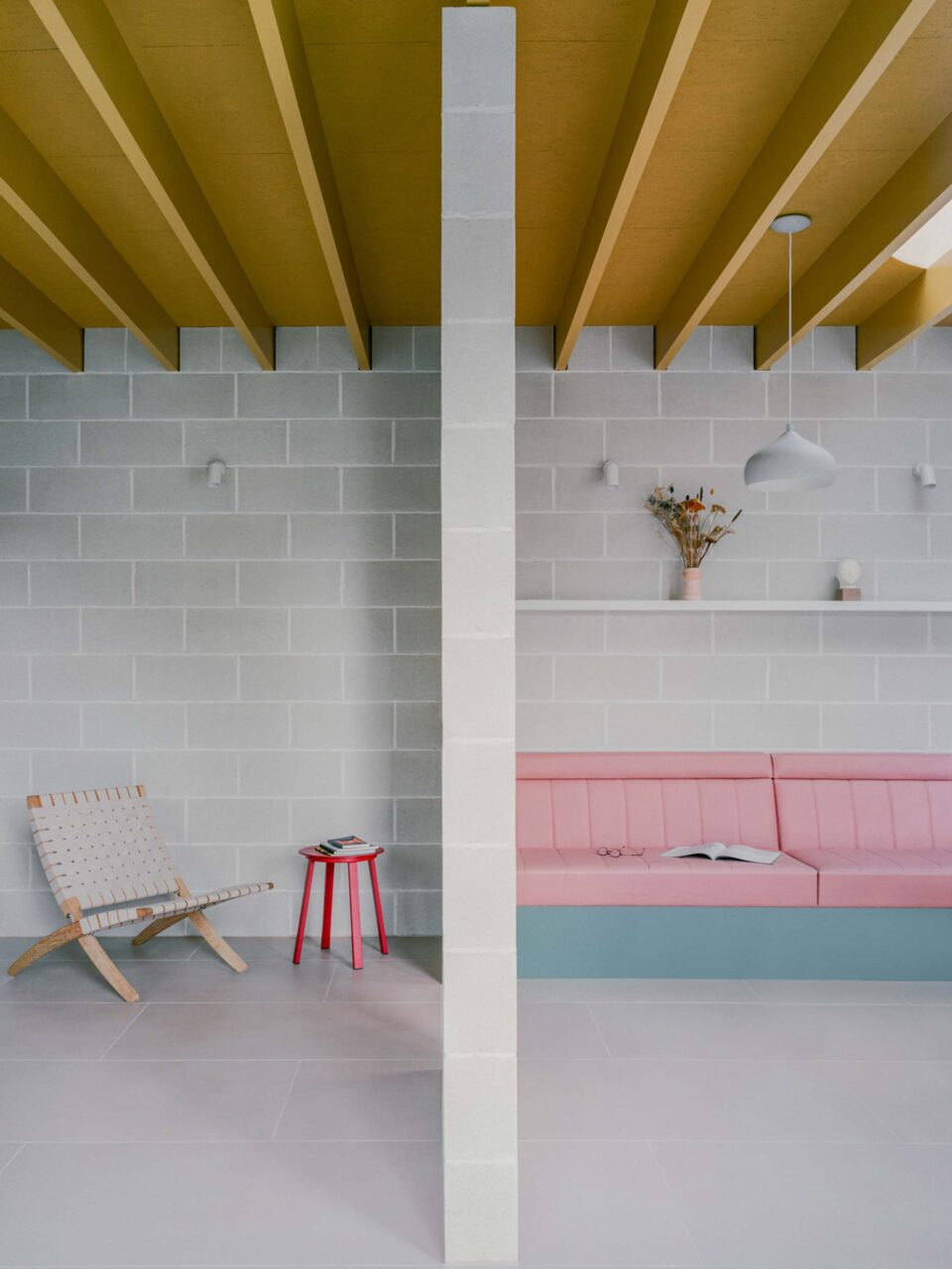 Yellow beams on the ceiling of Triangle House