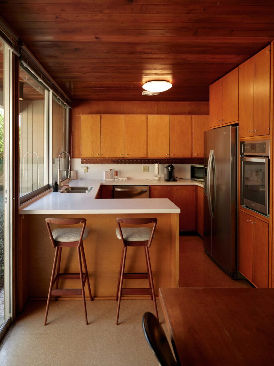 The kitchen of Gene Leedy's house by Strang