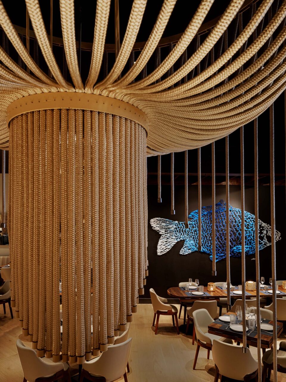 Mission Ceviche features columns clad in wood and netting