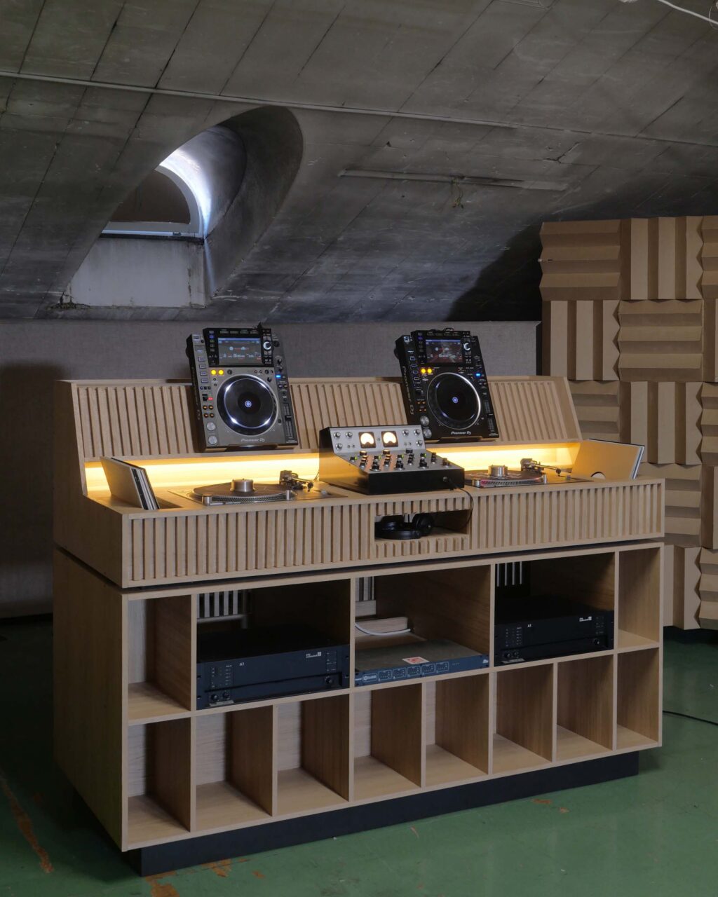 A cabinet for records, turntables, and a mixer