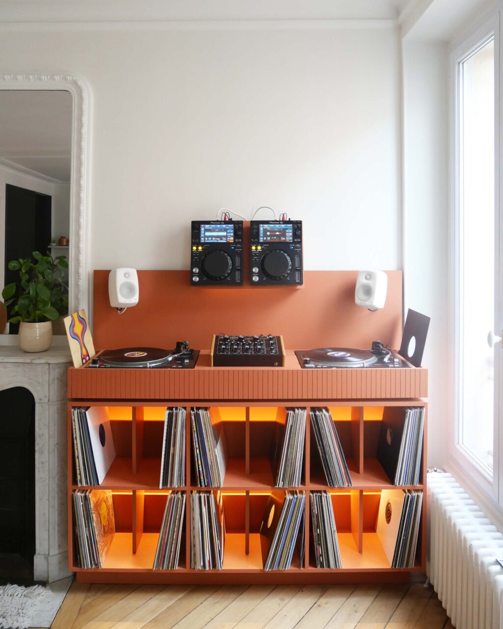 A vinyl storage cabinet and record player