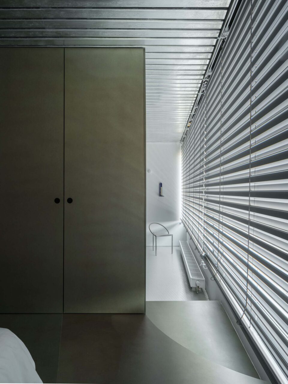 The surfaces of Studiolo are restrained and subdued