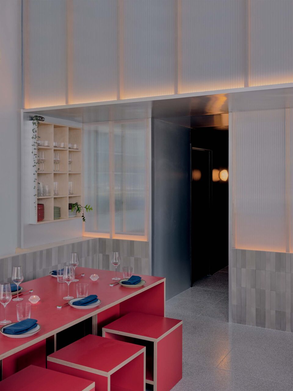 red dining table at Nin Hao by Plan Plan