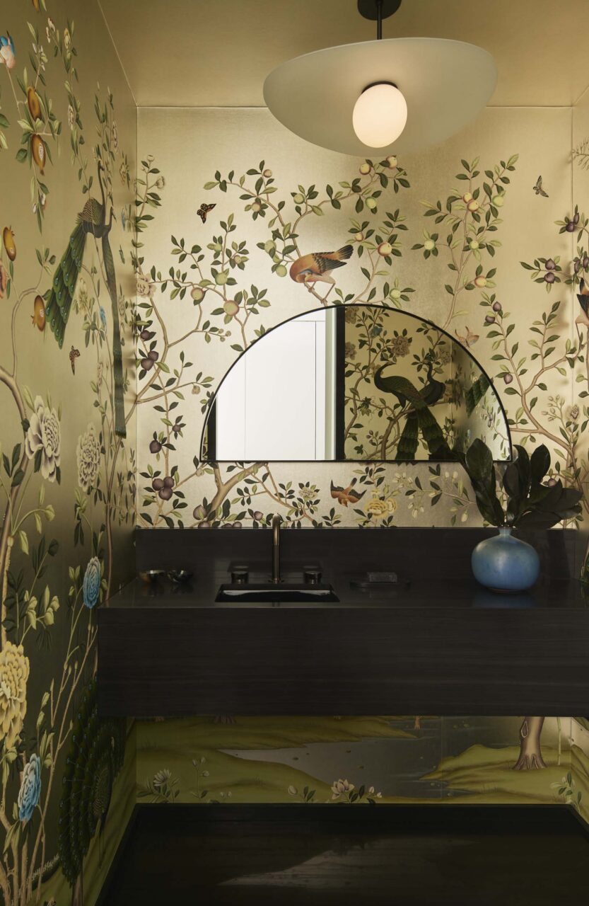 Federick Tang opt for a bird-filled wallpaper in the bathroom