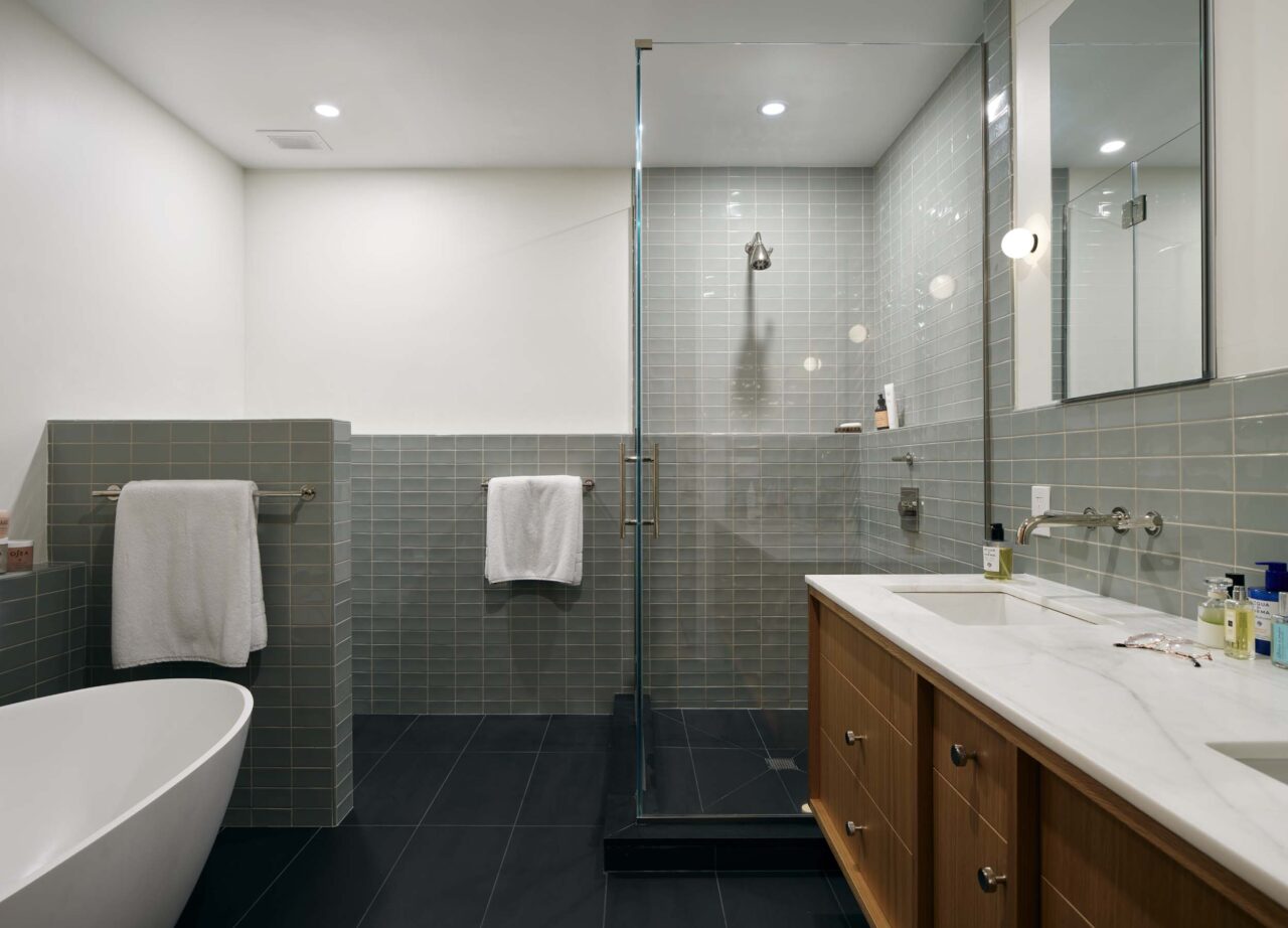 blue tile in bathroom in loft renovation by Sarah Jacoby Architect