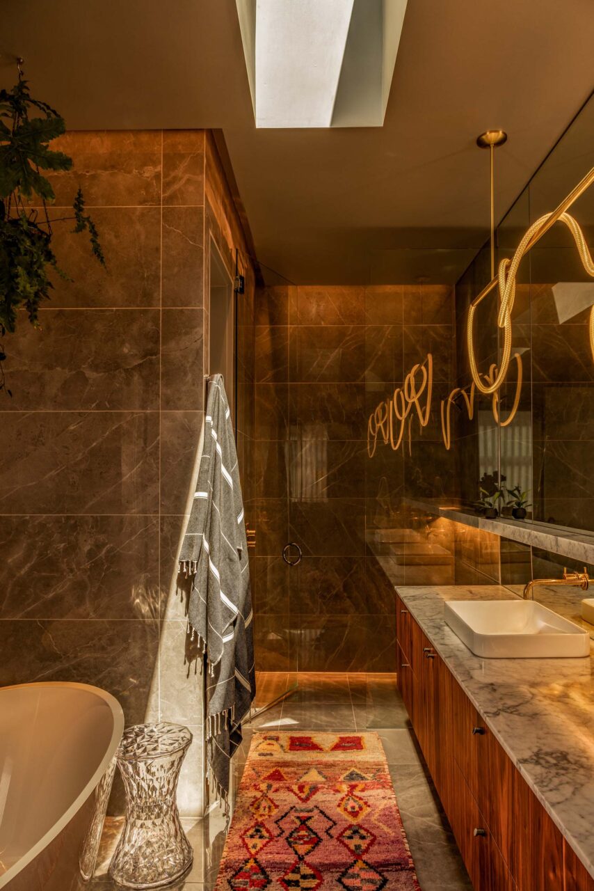 Bathroom with skylight by heirloom modern