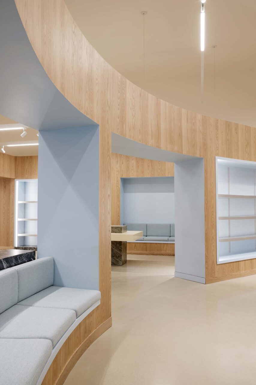 Ringo studio puts openings and seating nooks into the store