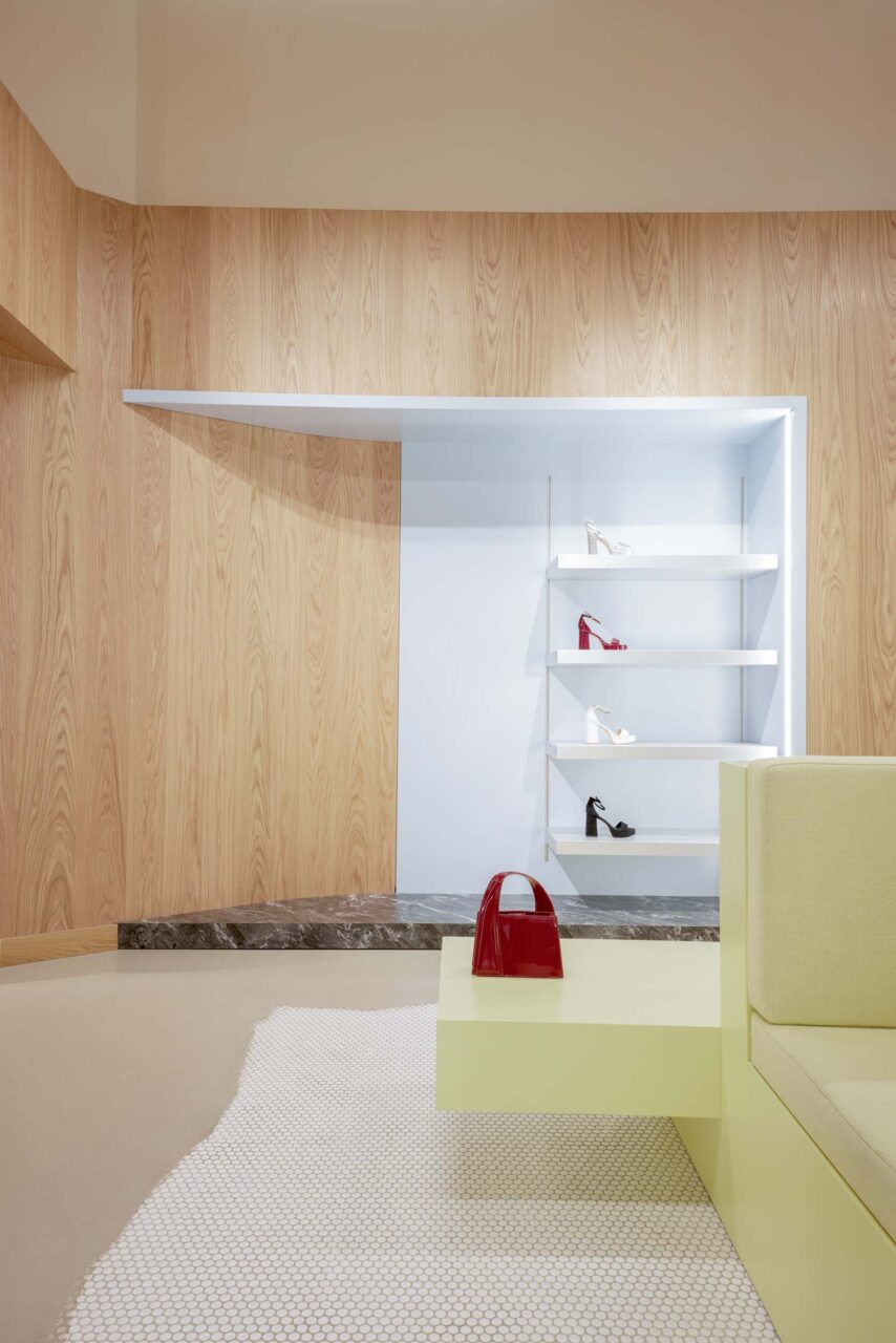 Display niches are carved into oak for the sculptural store