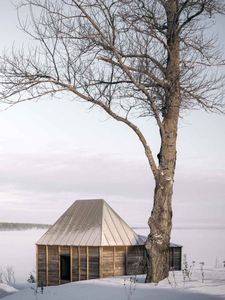 La cache cladding and conical roof