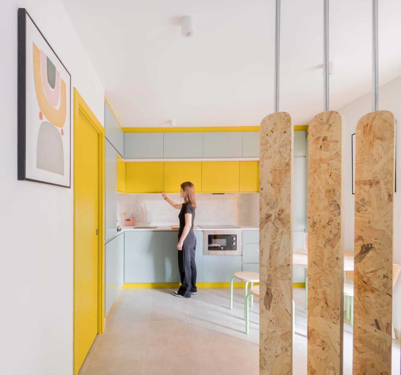 OOIO use wood chips as room dividers in apartments